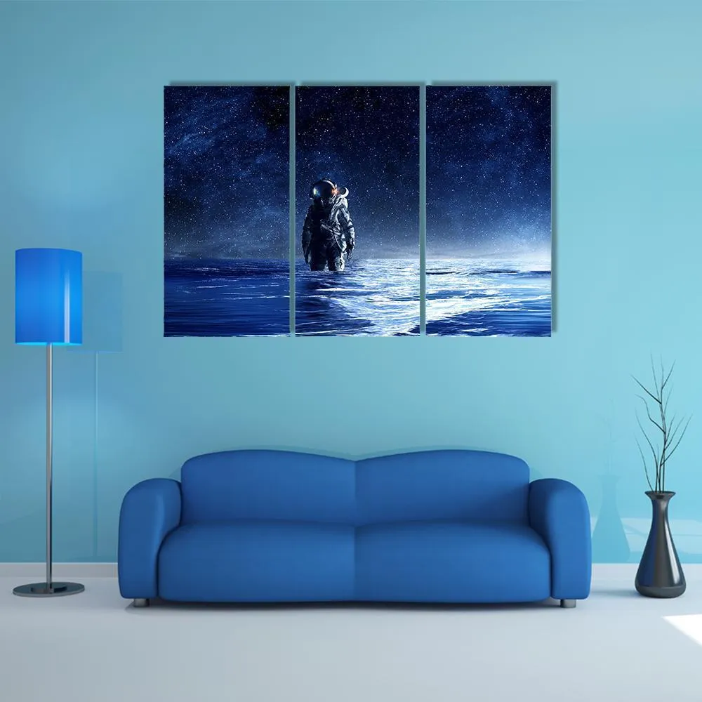 Astronaut Standing In Water Canvas Wall Art